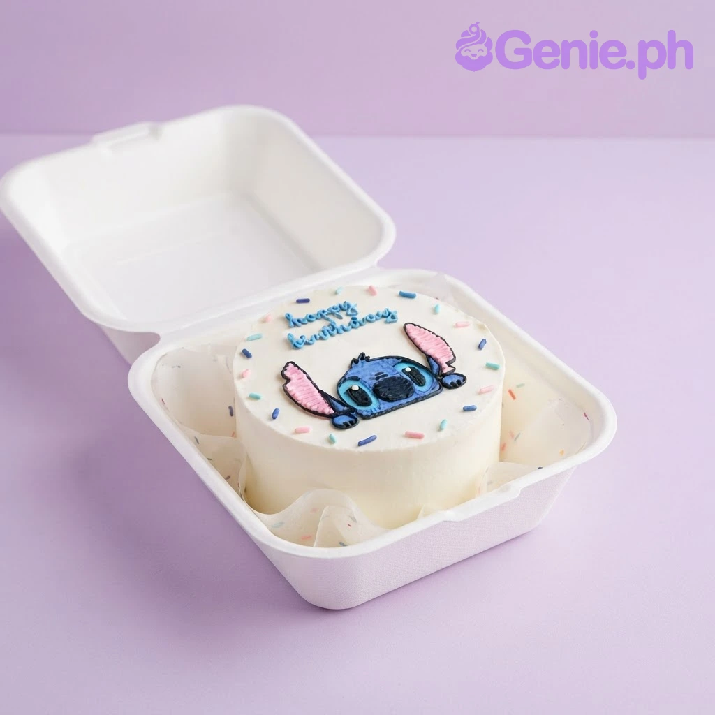 Stitch-Inspired Minimalist White Bento Cake White bento cake with smooth soft icing, flat-backed Stitch character artwork, and pastel sprinkles