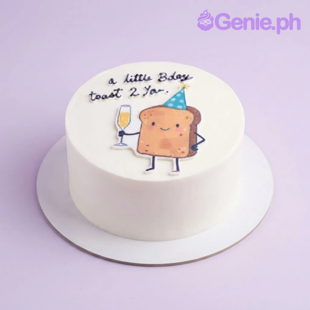 Toast Birthday White Bento Cake White bento cake with a printed toast character wearing a party hat and holding a champagne glass on top