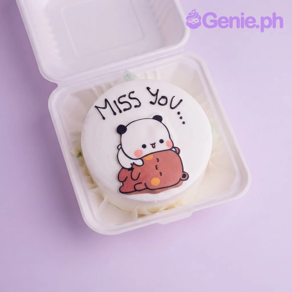 Bubu Dudu White Bento Cake White bento cake with smooth soft icing, Bubu Dudu panda character printout topper, and a piped message