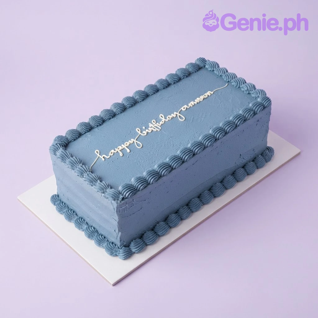 Blue Minimalist Navy Rectangle Cake Dark blue rectangular cake with smooth soft icing, piped dark blue shell top border, and a base border
