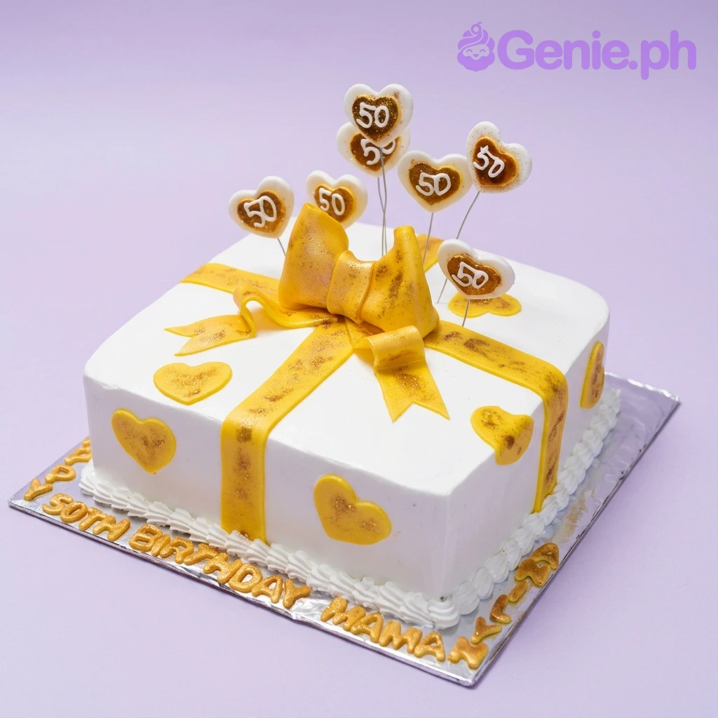 50th Birthday White Bow Cake A white and yellow square 50th birthday cake, featuring a yellow fondant bow, heart '50' toppers, and a gold message.