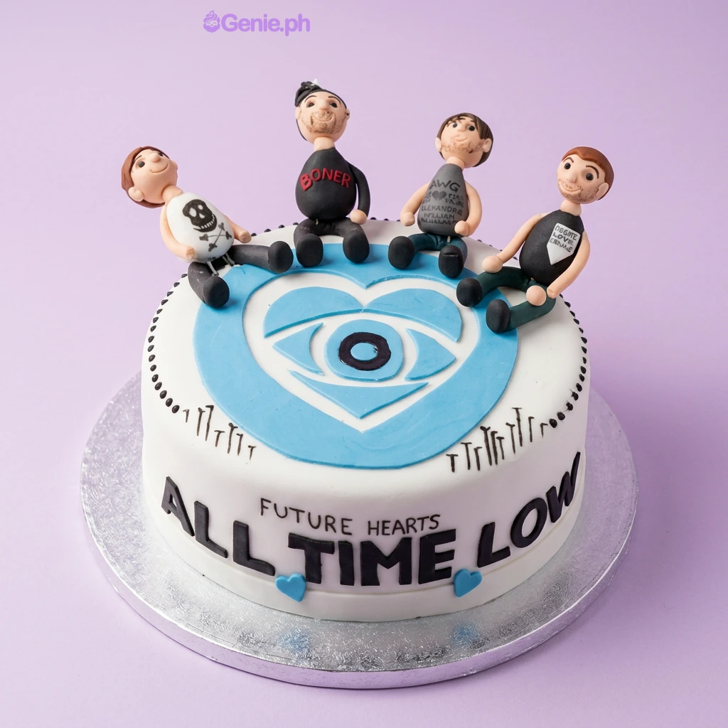 All Time Low White Heart Cake White 1-tier fondant cake with four sculpted band member figurines sitting on the edge and a blue heart logo on top