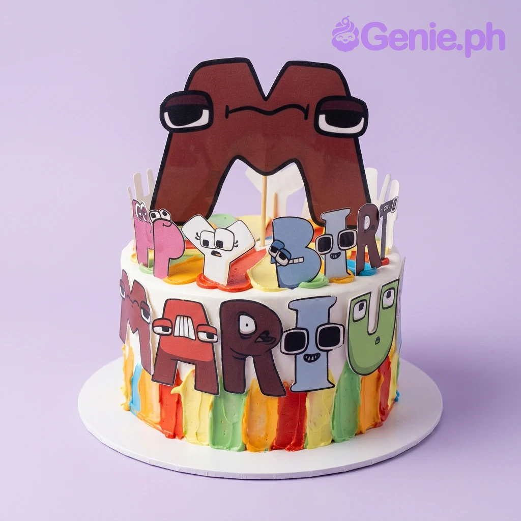 Alphabet Lore Birthday Cake Alphabet Lore themed birthday cake with colorful icing stripes and character printouts including a large letter M topper.