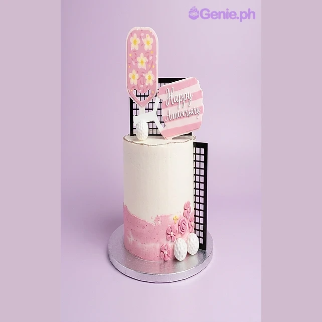 Anniversary White Floral Cake White and pink gradient 1-tier cake with a paddle printout, Happy Anniversary sign, and pink fondant flowers