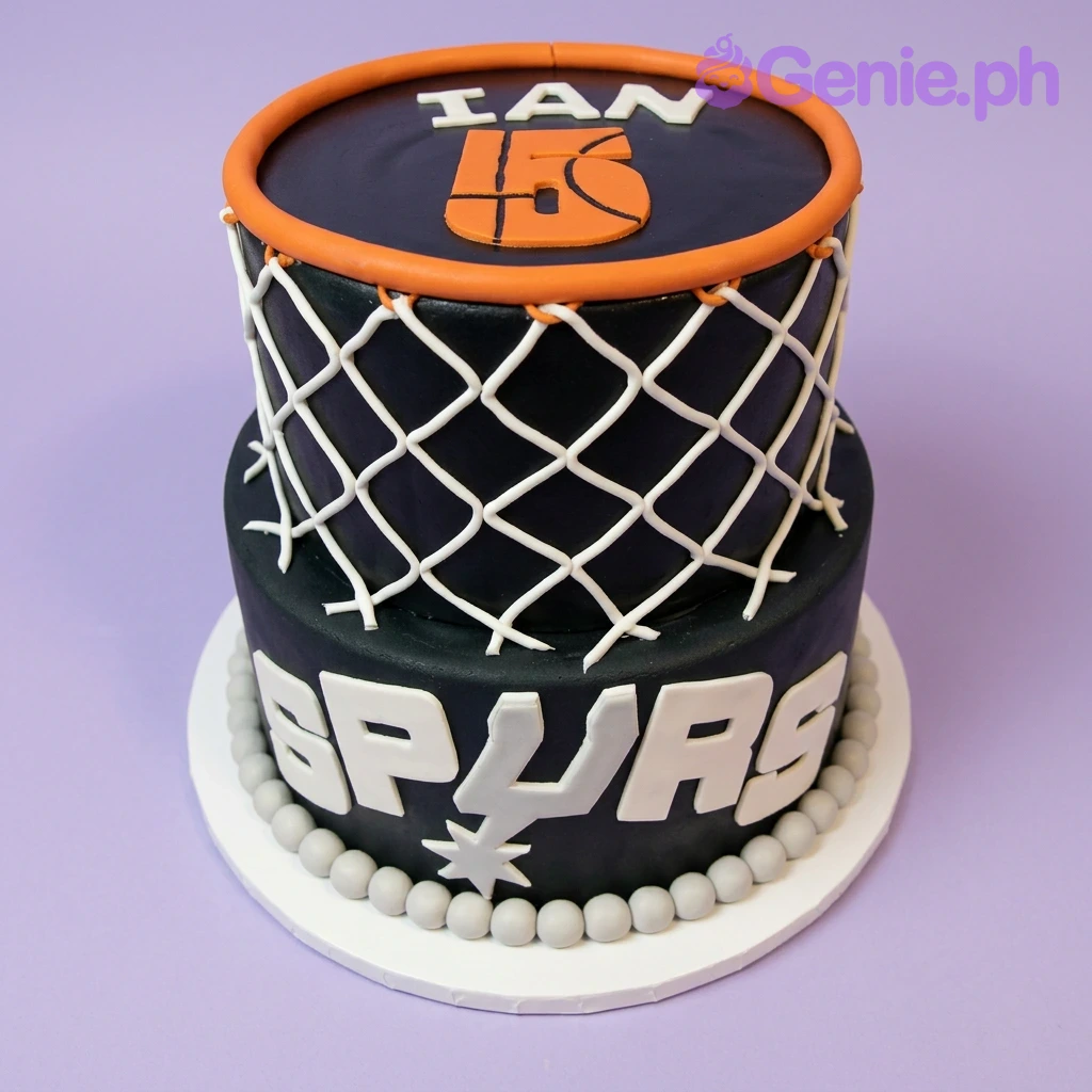 Basketball Spurs Black 2-Tier Birthday Cake Black 2-tier basketball cake with orange rim and white net icing design featuring San Antonio Spurs logo and name Ian