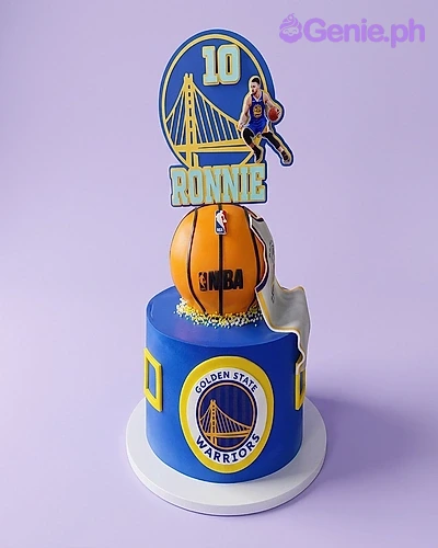 Basketball Warriors Blue Birthday Cake A blue Golden State Warriors 1 Tier basketball cake, with a 3D basketball topper and Stephen Curry printouts.