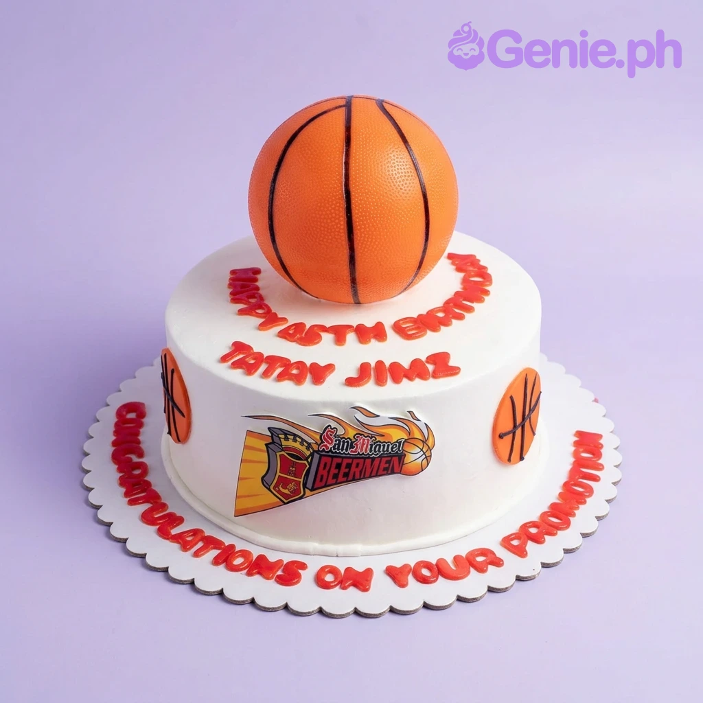 Basketball White Birthday Cake White basketball themed cake with a large orange basketball topper and San Miguel Beermen logo for a 45th birthday and promotion.