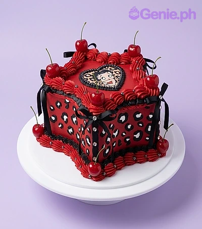 Betty Boop Red Heart Birthday Cake A red square Betty Boop cake with a heart topper, leopard print sides, and red cherries.