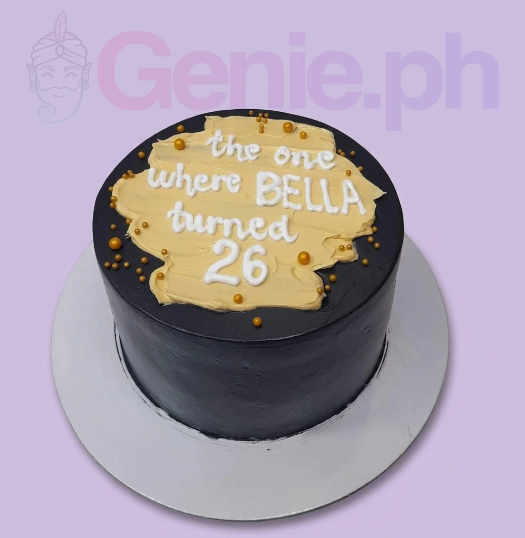 Black Minimalist Birthday Cake A black and yellow 1-tier minimalist cake with a yellow palette knife center, white piped message, and gold pearls.