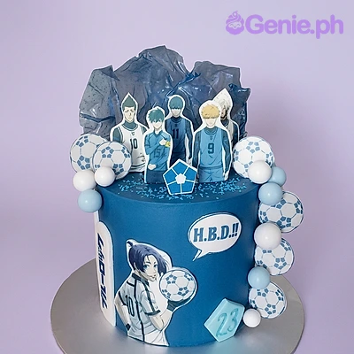 Blue Lock Birthday Cake Blue Lock anime themed 1-tier birthday cake with character cutouts, soccer ball prints, and a blue isomalt structure