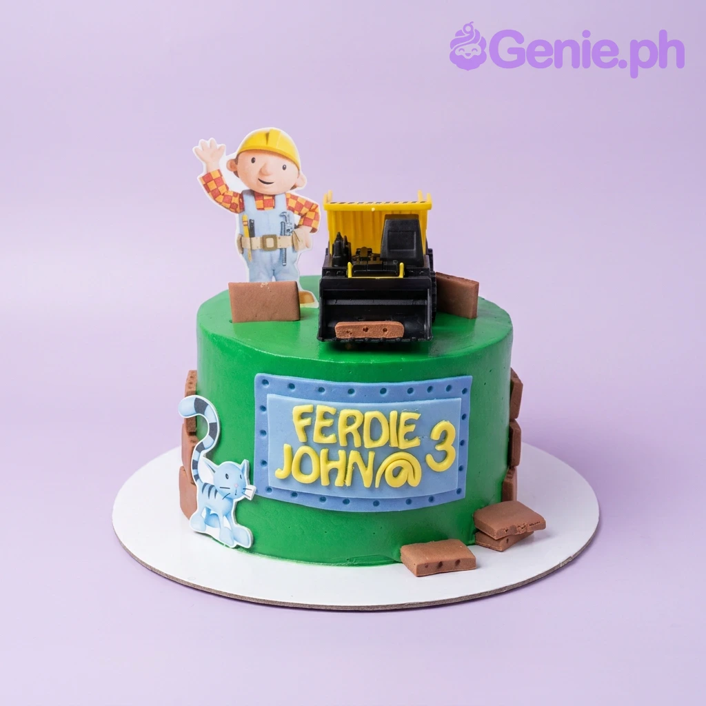Bob The Builder Green Birthday Cake Green Bob the Builder themed birthday cake with a toy construction truck and fondant brick decorations.