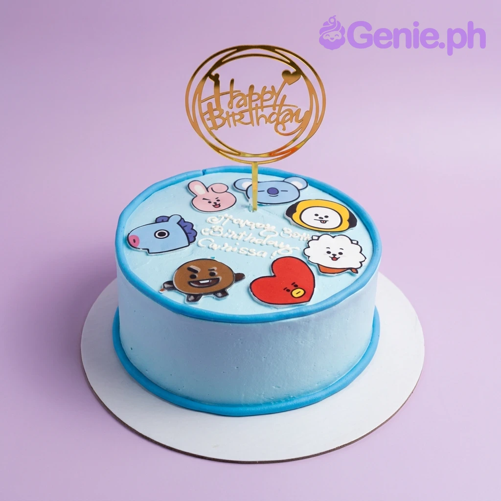 BT21 Kpop-Inspired Sky Blue Birthday Cake Light blue BT21 themed birthday cake with character printouts and a gold Happy Birthday topper.
