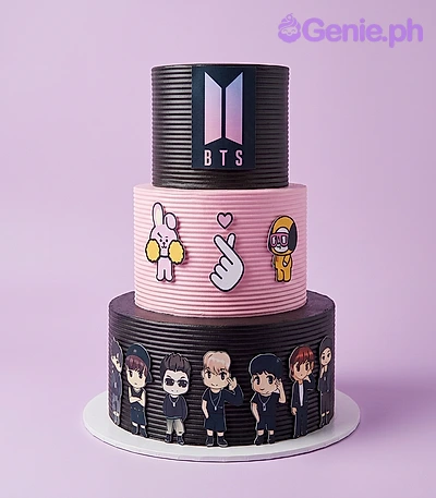 BTS Kpop-Inspired 3-Tier Cake Three tier black cake with BTS logo, BT21 characters, and BTS member cutouts, featuring ribbed icing texture