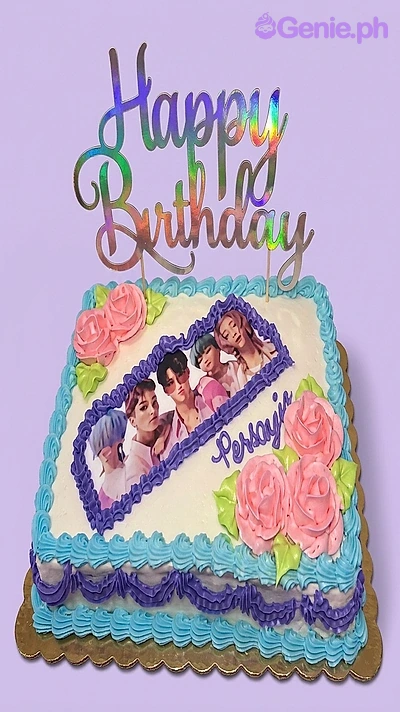 Rectangle K-pop cake with edible photo print, birthday topper, pink icing roses, and blue and purple piped borders.