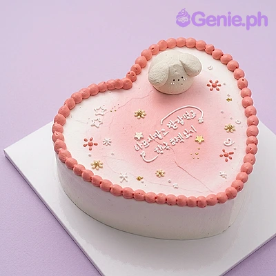 Bunny Heart Pink Birthday Cake Heart-shaped cake with pink gradient icing, a small bunny figure, and piped border