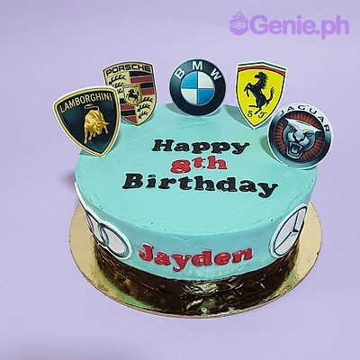 Car Logo Sky Blue Birthday Cake A light blue 1-tier Car Logo cake, featuring various luxury car brand printouts and red icing text.