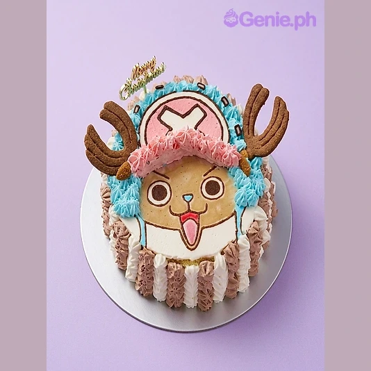 Chopper Christmas Cake Round cake decorated as Tony Tony Chopper from One Piece with cookie antlers and Christmas holly
