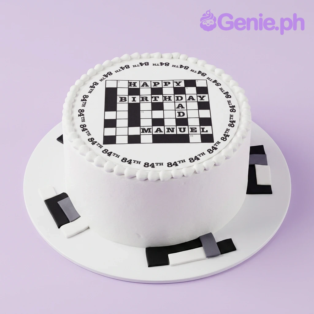Crossword Puzzle White Birthday Cake A white and black 1-tier crossword cake, featuring a crossword print, '84th' border, icing beads, geometric panels.