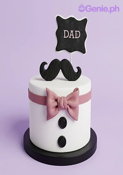 Dad Tuxedo White Bow Birthday Cake White fondant tuxedo cake for Dad with a black mustache topper, pink bow tie, and black buttons.