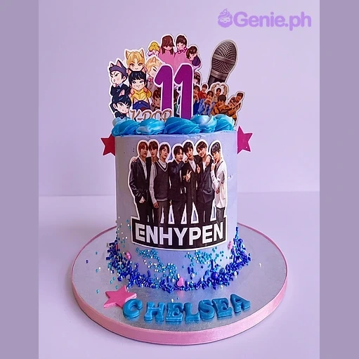 Enhypen Kpop-Inspired Lavender Birthday Cake Purple 1-tier birthday cake with Enhypen K-pop band printout toppers and blue icing swirls