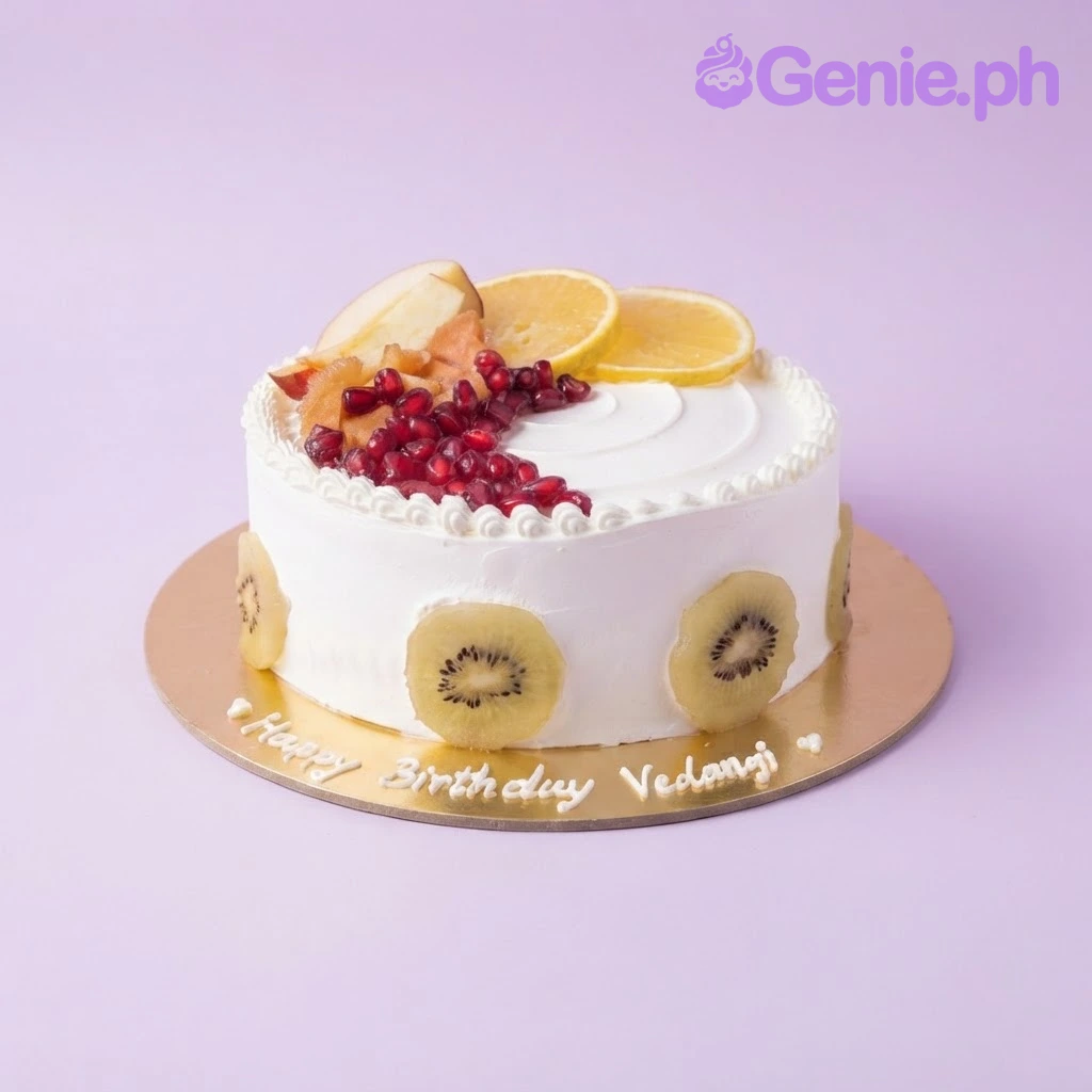 Fruit Birthday White Cake White 1-tier soft icing birthday cake decorated with fondant molded fruit slices and piped shell borders