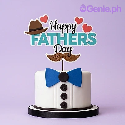 Father's Day White Bow Cake White 1-tier fondant cake for Father's Day with a blue bow tie and a Happy Father's Day printout topper