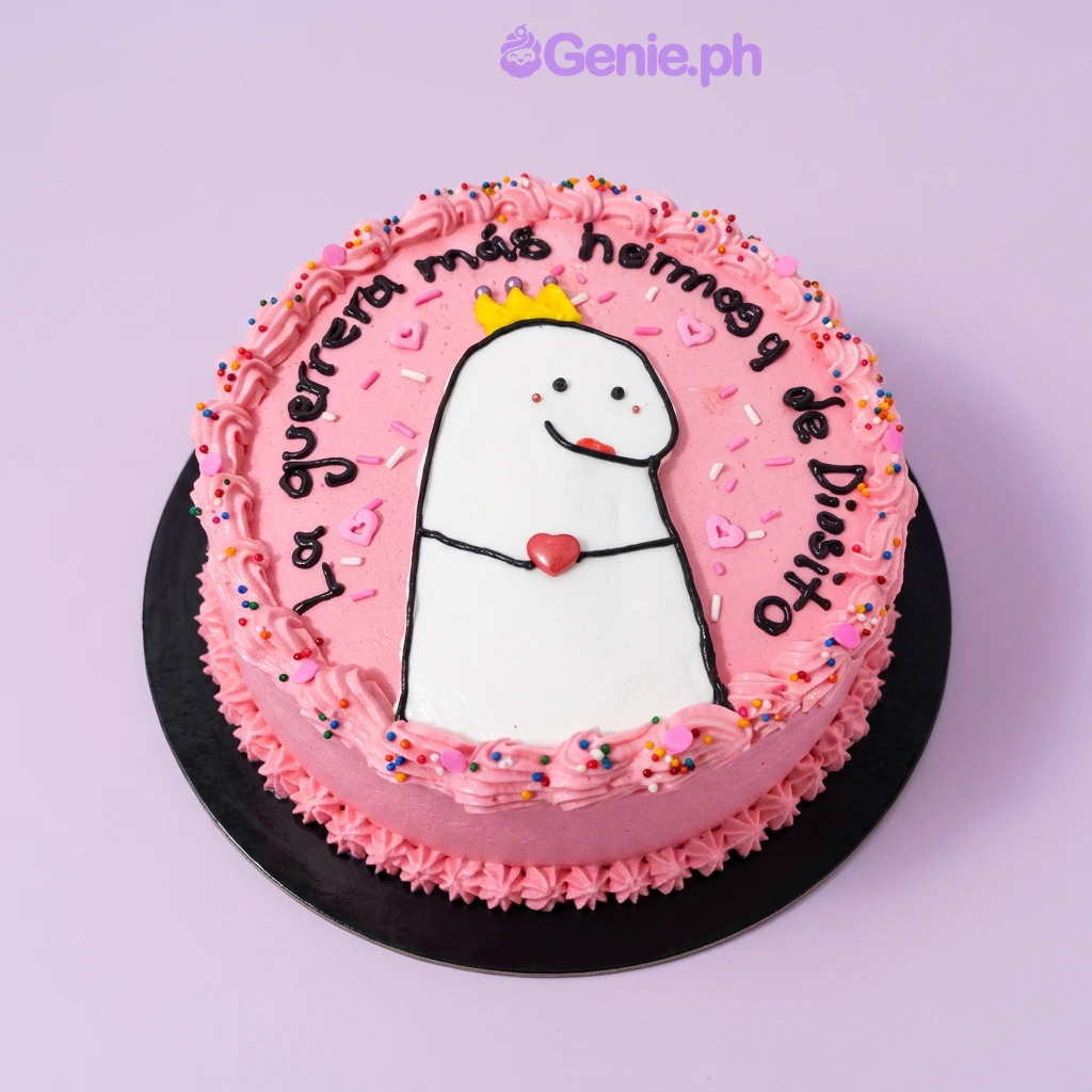 Flork Pink Heart Birthday Cake Pink round cake with a Flork character printout, a small fondant crown, and a heart, with piped icing borders and colorful sprinkles