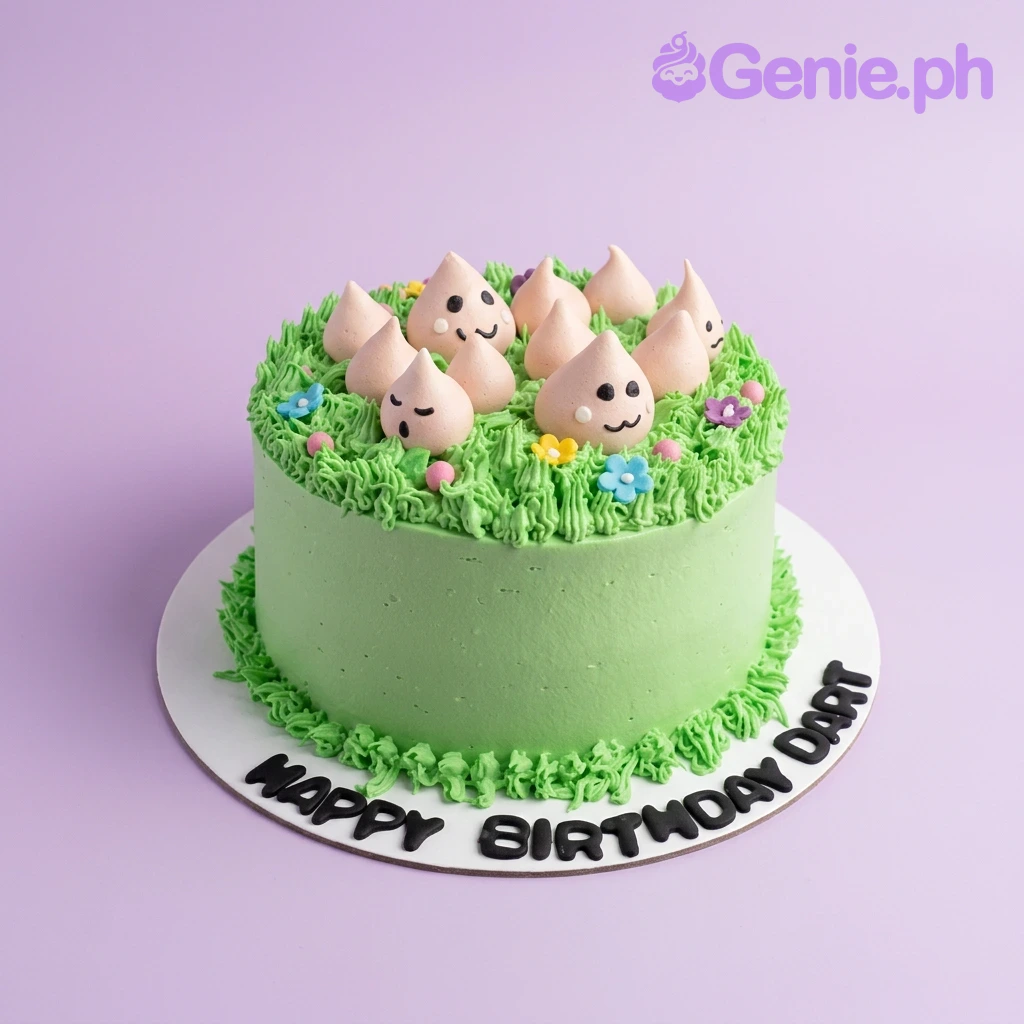 Grass Theme Mint Floral Birthday Cake A green and pink 1-tier cake themed around Grass, featuring pink blob characters, colorful icing flowers, and 'HAPPY BIRTHDAY DART' text.