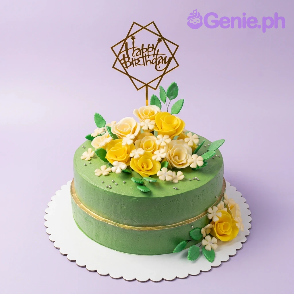 Green Floral Birthday Cake A green one-tier cake themed Green Floral, featuring a gold geometric Happy Birthday topper and gumpaste floral accents.