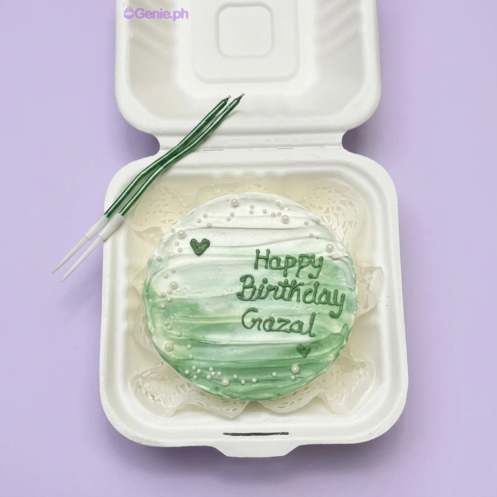 A green and white Bento cake themed Minimalist, with horizontal textured icing, white pearls, and 'Happy Birthday Gazal' text.