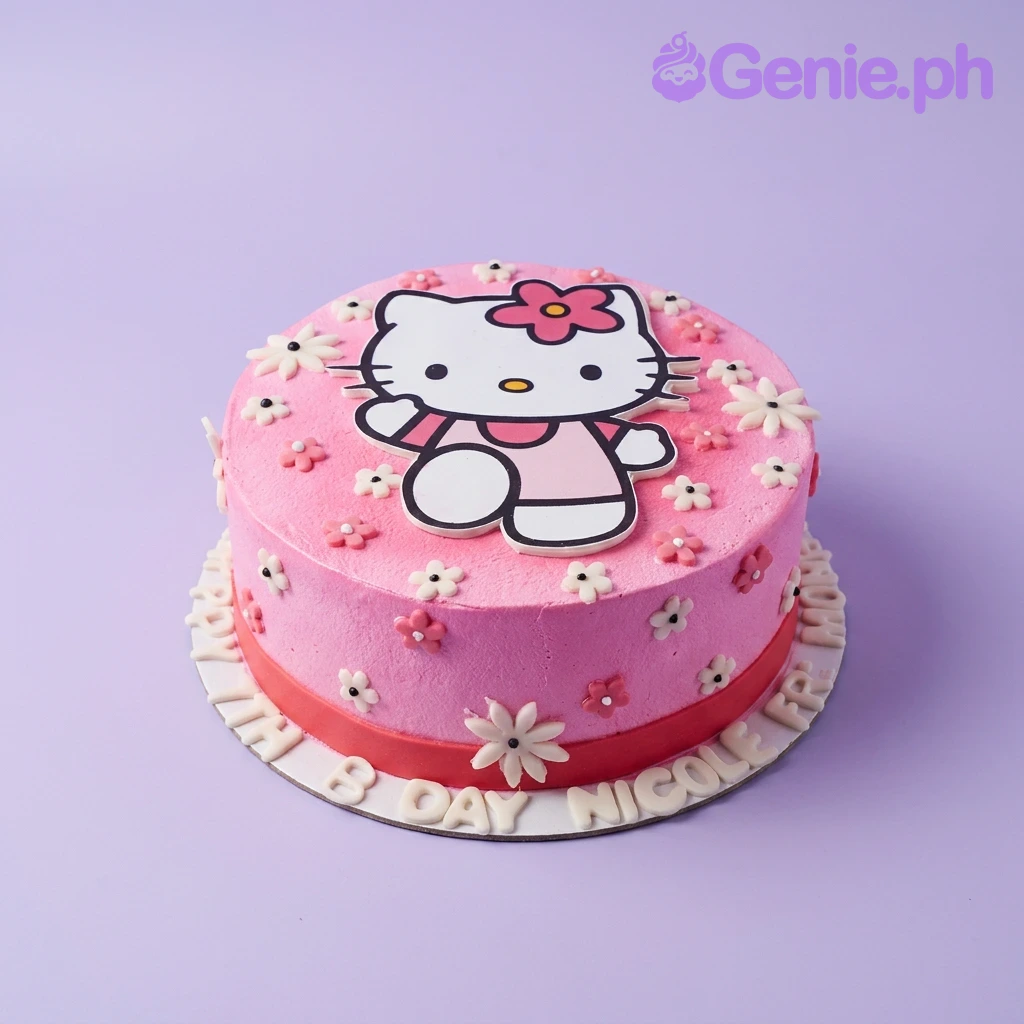 Hello Kitty-Inspired Light Pink Birthday Cake A pink 1 Tier Hello Kitty themed cake, featuring a large Hello Kitty printout topper and white and pink fondant flowers.