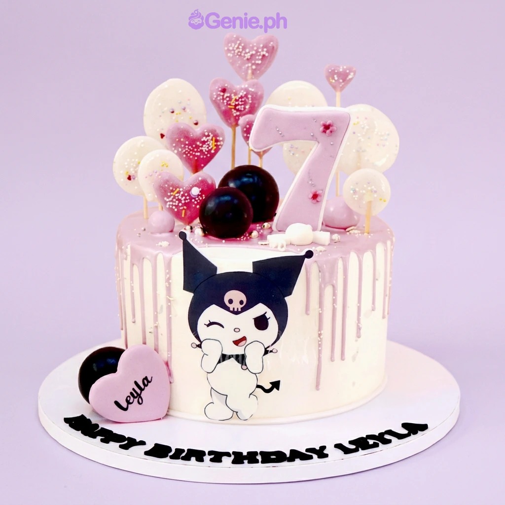 Kuromi-Inspired Birthday White Drip Cake White 1-tier cake with lavender drip, Kuromi character printout, number seven topper, and heart lollipops.