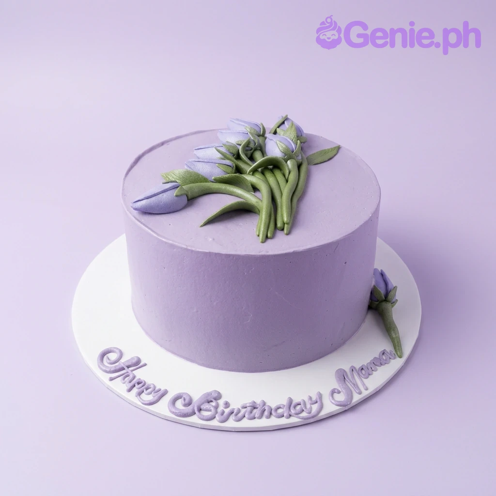 Lavender Tulip Floral Birthday Cake A lavender 1-tier cake with purple fondant tulip bouquet and green leaves, and text on base.
