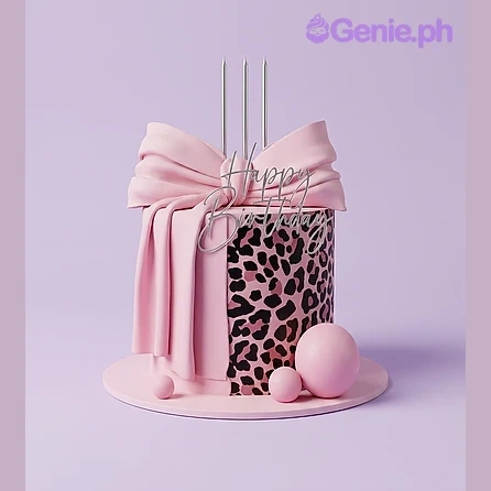 Leopard Bow Pink Birthday Cake Pink 1-tier fondant cake with leopard print side, large fondant bow, and Happy Birthday topper