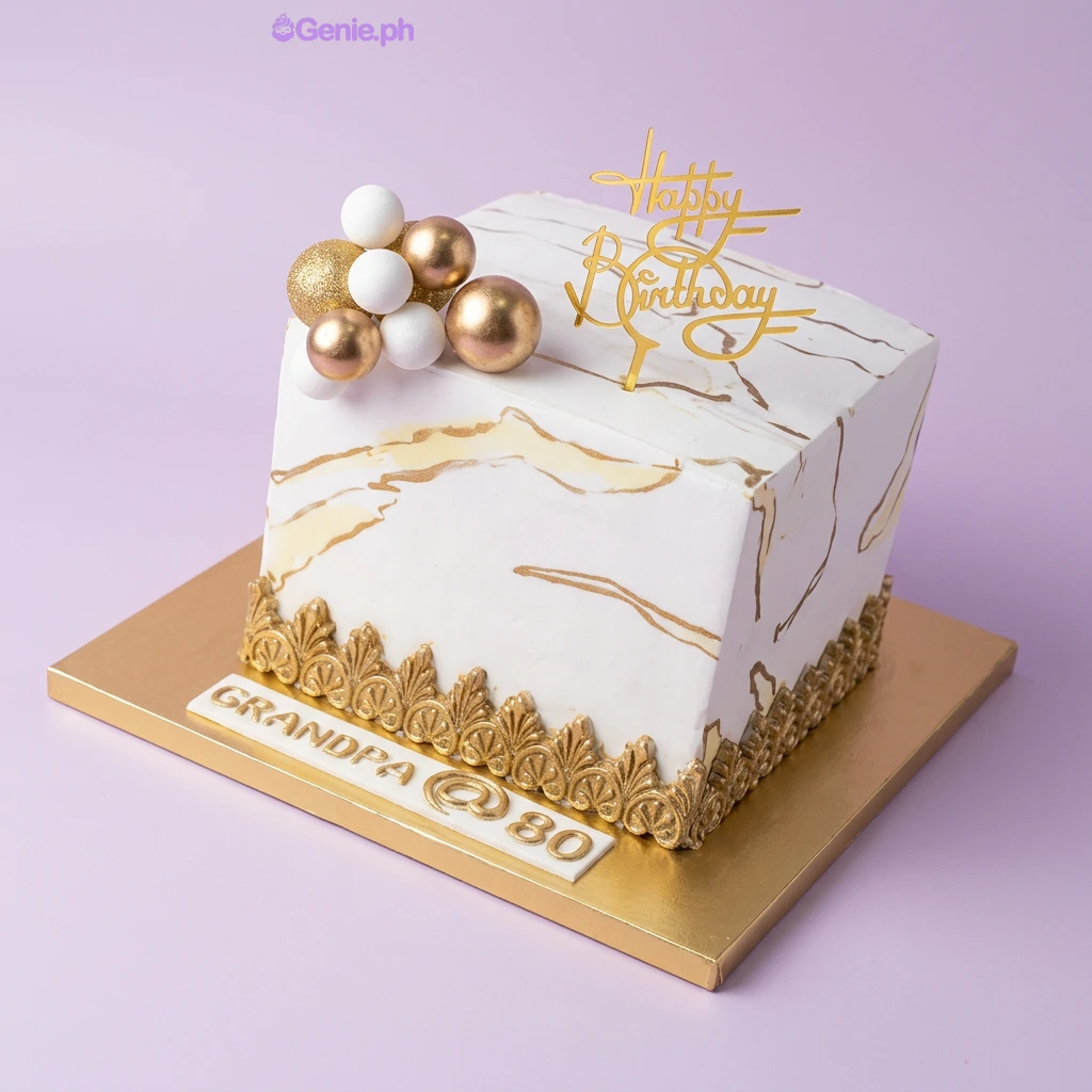 Marble Birthday White Cake White square marble cake with gold accents, a Happy Birthday cardstock topper, and a cluster of gold and white spheres