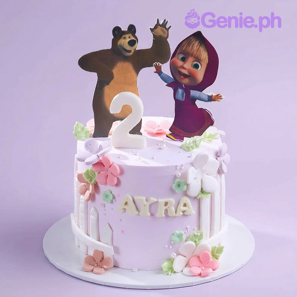 Masha Bear Lavender Birthday Cake Lavender 1-tier cake with soft icing, Masha and the Bear printouts, a number 2 candle, and a white picket fence panel.