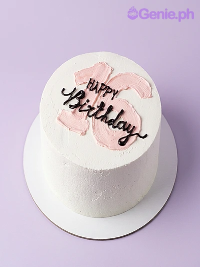White single-tier birthday cake with pink textured icing number 16 and black piped Happy Birthday message