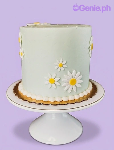 Mint Daisy Floral Birthday Cake A mint green tall 1-tier cake themed around Mint Daisy, featuring white and yellow fondant daisies and a white pearl border on a gold board.