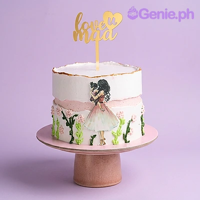Mother's Day White Cake White 1 tier cake with gold Love U Maa topper, girl holding pet printout, green vines, and pink flowers