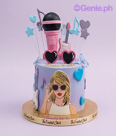 Music Theme Lavender Heart Birthday Cake Lavender gradient 1-tier cake with a Taylor Swift character printout, 3D microphone, guitar, and heart sunglasses toppers.