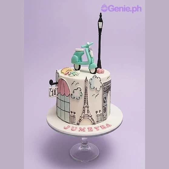 Paris Scooter White Birthday Cake White 1-tier fondant cake with a blue scooter and lamp post topper featuring hand-painted Parisian landmarks on the side