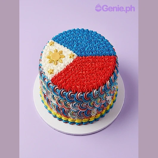 Philippine Flag Birthday Cake Round cake with piped icing in the design of the Philippine flag featuring blue, red, white, and yellow colors.