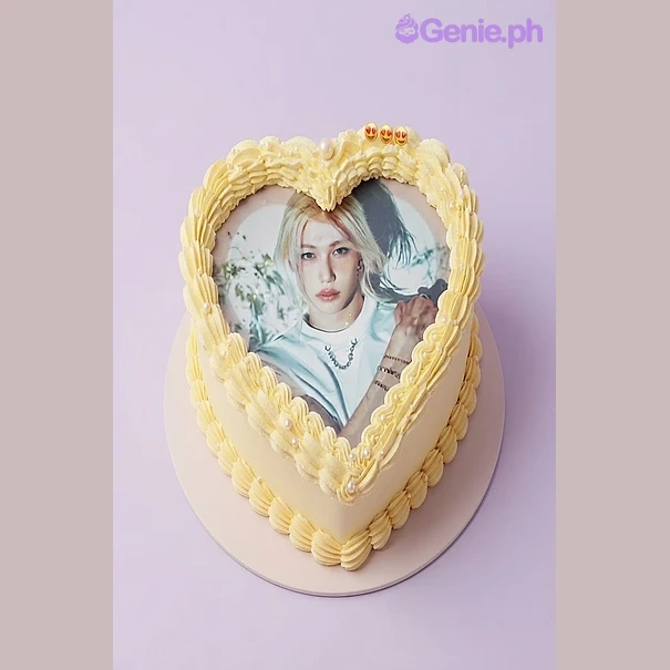 Photo Ivory Heart Birthday Cake Light yellow heart-shaped cake with a photo print of a person on top and a piped border