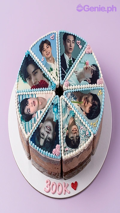 Photo White Floral Cake White round cake cut into eight slices, each topped with an edible photo print, light blue piped borders, and pink icing flowers.