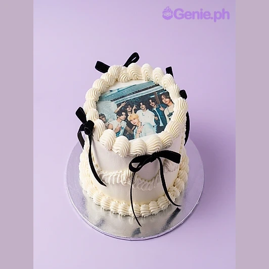 Photo White Cake One tier white cake with a rectangular photo print and black ribbon