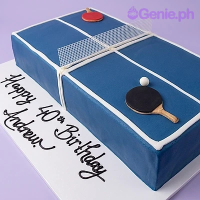 Ping Pong Blue Rectangle Birthday Cake A blue Rectangle Fondant cake themed around Ping Pong, featuring red and black paddles, a white ball, a net, and white table lines.