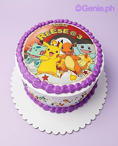 A white 1 tier cake featuring Pokemon characters printout, edible side wrap, purple icing border on top and base.