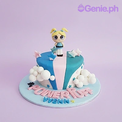 Powerpuff Girls Birthday Cake A blue, pink, and teal 1 Tier Fondant cake themed around Powerpuff Girls Bubbles, featuring a Bubbles figurine, stripes, and white clouds.