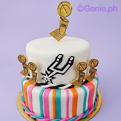San Antonio Spurs 2-Tier Cake White 2-tier fondant cake with San Antonio Spurs logo and five gold basketball trophy printouts