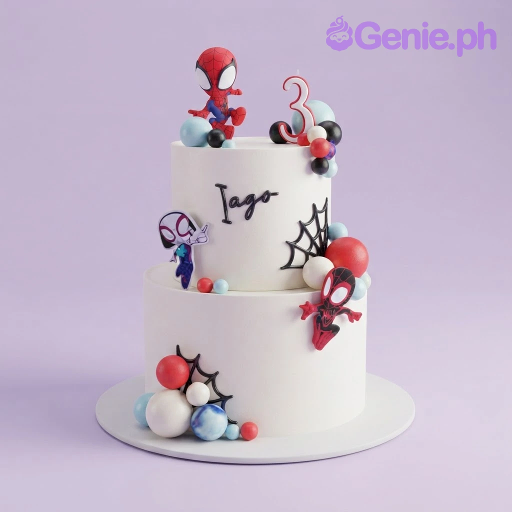 Spiderman-Inspired White 2-Tier Birthday Cake White 2-tier soft icing cake with Spiderman printouts, number three candle, and colored plastic spheres